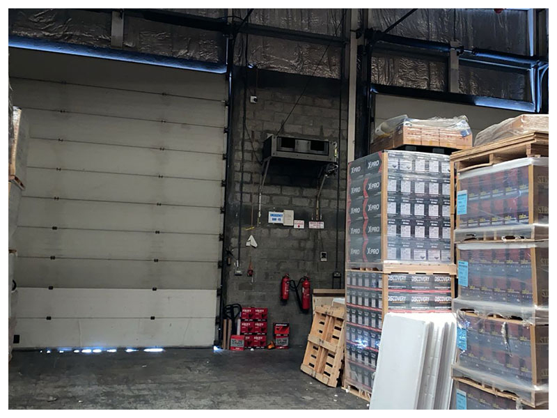 Warehouse door with stacked boxes